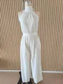 Elegant white halter neck backless wide-leg jumpsuit for women on a mannequin display - 3XL / Top And Bottom / White