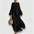 Elegant black maxi dress featuring pleated texture and multi-layered ruffle sleeves. - XS / Dresses / Black