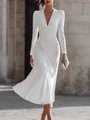 Detail of elegant V-neck ruched long sleeve white midi dress with asymmetrical draping - XS / Dresses / White