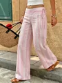 Side view of pink and white striped wide-leg pants featuring a low waist and tie detail. - S / Bottoms / Pink