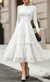 Élégante robe blanche à manches longues avec dentelle à volants et détails en tulle brodé - S / Robes / Blanc