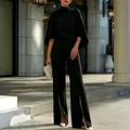 Elegantes schwarzes Set mit Rollkragen-Cape-Oberteil und High-Waist-Schlitzhose für Damen - S / Oberteil Und Unterteil / Schwarz