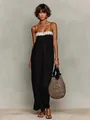 Detailed view of women's black sleeveless summer resort maxi dress featuring white floral lace - XS / Dresses / Black