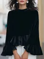 Detailed view of elegant black velvet long sleeve top featuring stylish ruffle hem details - S / Tops / Black