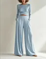 Completo due pezzi in maglia azzurro con top incrociato e pantaloni a gamba larga - Azzurro