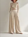 Elegant beige long sleeve wrap top and pleated wide leg trousers two piece set on model - XS / Top And Bottom / Off White