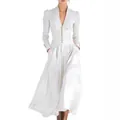 Detailed view of elegant white V-neck puff sleeve maxi dress with cinched button waist. - S / Dresses / White