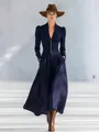 Detail view of elegant navy V-neck maxi dress with puff sleeves and button accents - S / Dresses / Navy Blue
