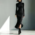 Elegant long sleeve black turtleneck dress featuring pleated waist and ruffled hem details. - XS / Dresses / Black