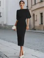 Elegant black midi dress with mid-length sleeves shown in an outdoor street setting - XS / Dresses / Black