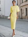 Elegant pale yellow boat-neck midi dress with short sleeves shown in a street setting - XS / Dresses / Yellow