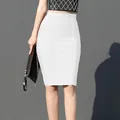 Close-up of high-waisted white bandage pencil skirt showing textured fabric and bodycon fit. - S / Bottoms / White