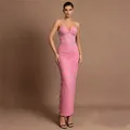 Full-body detail of elegant pink bandage dress with intricate rhinestone embellishments - S / Dresses / Pink