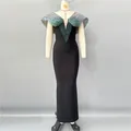 Elegant black bandage maxi dress featuring intricate gradient beadwork on the deep V-neckline. - S / Black