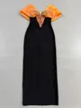 Detailed view showing the orange beaded off-the-shoulder neckline on a black bandage dress - S / Orange