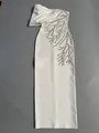 Detail of elegant white bandage maxi dress with sparkling silver rhinestone embroidery - S / Dresses / White