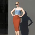 Full view of elegant orange high-waisted bandage skirt with slimming bodycon fit - Tan