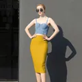 Elegant high-waist stretchy yellow bandage midi skirt showing a slim fit for women - S / Bottoms / Yellow