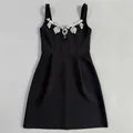 Sleeveless black bandage mini dress featuring crystal rhinestone neckline embellishments - S / Dresses / Black