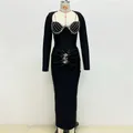 Elegant black long-sleeved bandage dress with intricate rhinestone embellishments. - S / Dresses / Black