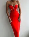 Macro view of luxurious rhinestone embellishments on a red bodycon bandage dress. - S / Dresses / Red