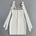 Robe moulante blanche élégante avec décolleté en strass et grands nœuds aux épaules - S / Robes / Blanc