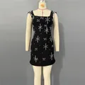 Front view of elegant black bandage mini dress featuring sparkling rhinestone floral patterns - S / Dresses / Black