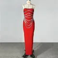 Detailed view of red bandage dress featuring intricate silver rhinestone patterns. - S / Dresses / Red