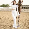 Elegant white bandage two-piece set featuring lace crop top and flared pants outfit - S / Top And Bottom / White