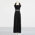 Elegant black two-piece pleated set featuring a halter flounce top and high-waist wide-leg pants - One Size / Top And Bottom / Black