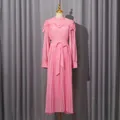 Full-length view of a pink pleated chiffon dress displayed on a dress form mannequin - S / Dresses / Pink