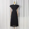 Vue détaillée de l'ensemble vintage noir avec chemise à volants et jupe en dentelle. - S / Haut Et Bas / Noir