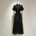 Robe chemise brodée vintage noire élégante avec manches bouffantes et ceinture - S / Robes / Noir