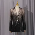 Detailed view of women's gradient sequin blazer with shimmering champagne and black sequins - M / Top And Bottom / Champagne