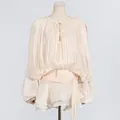 Elegant cream pleated mini dress with a bow neck and tiered ruffle hem - S / Dresses / Apricot