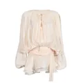 Close-up detail of champagne shimmer beach dress with long lantern sleeves and ruffles - S / Dresses / Apricot