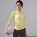 Breathable yellow long-sleeve yoga top for women, slim fit pilates gym wear detail - Yellow