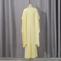 Back view of elegant yellow high waist dress featuring a pearl-edged shawl detail - S / Dresses / Yellow