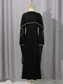 Elegant black high-waisted maxi dress featuring a pearl-trimmed cape, front view on mannequin - S / Dresses / Black