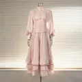 Elegant light pink vintage-style long dress featuring lantern sleeves and tiered ruffled skirt - S / Dresses / Pink
