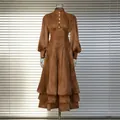 Elegant vintage brown dress with lantern sleeves, tiered ruffled skirt, and pleated waist - Brown