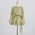 Front view of an elegant sage green mini dress with tie neck and tiered ruffled skirt - S / Dresses / Light Green