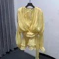 Elegant yellow pleated long sleeve mini dress featuring a waist tie and ruffle hem - S / Dresses / Yellow