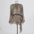 Elegant brown pleated mini dress featuring a round neck tie and ruffled skirt detail - Chestnut