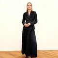 Detailed view of elegant black blazer suit with rhinestone embroidery and pleated skirt - S / Top And Bottom / Black