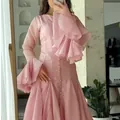Elegant pink mermaid dress featuring dramatic tiered ruffle sleeves and mesh fabric. - M / Dresses / Pink