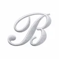 Detailed macro view of white cursive letter B embroidered patch with 6.14cm x 4.67cm size - Letter B
