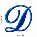 Detailed view of blue embroidered letter D patch with 4.70x4.95 cm dimensions for DIY crafts. - Letter D