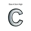 Detailed white embroidered letter C alphabet patch with black border, 4.5cm high - Letter C / 4.5cm High