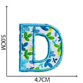 Toppa ricamata lettera D a fiori blu con misure 5x4,7 cm - Lettera D / 5.0x4.7cm
